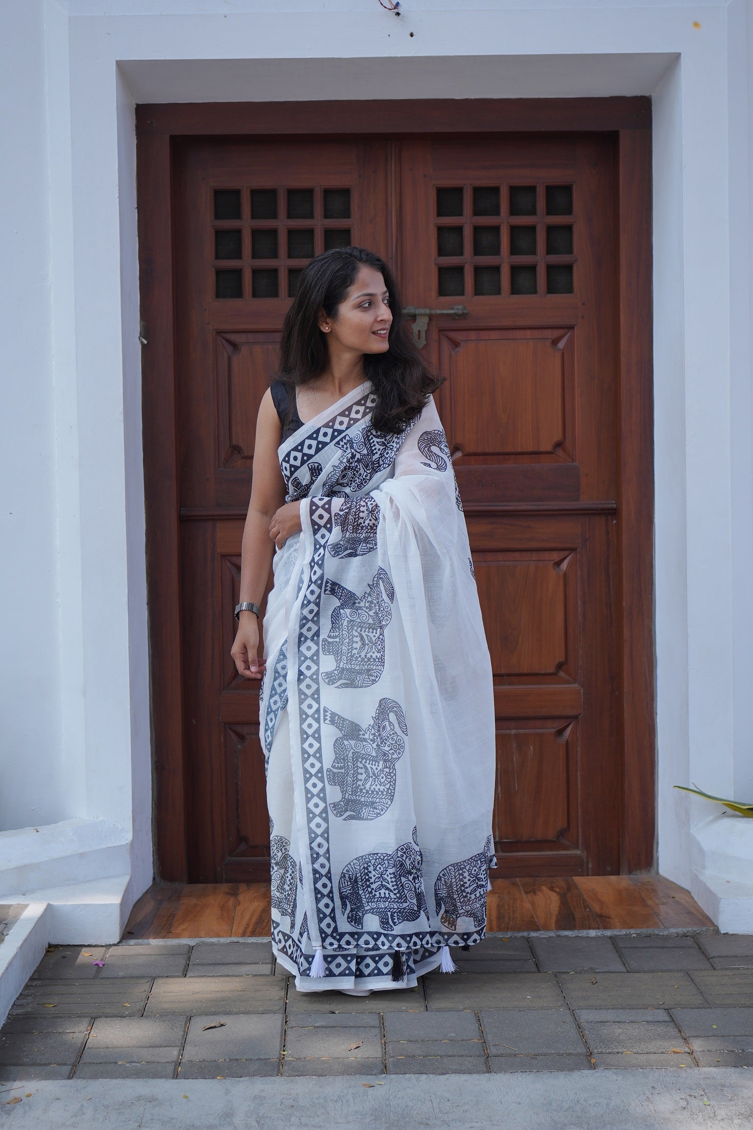 Handloom linen cotton printed festive saree by The Drape Culture
